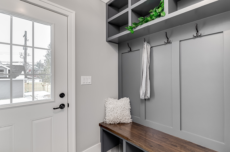 Mudroom ideas with hangers, bench and cubbies
